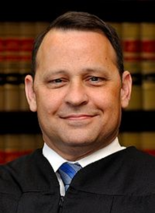 Portrait of John R. Lopez IV